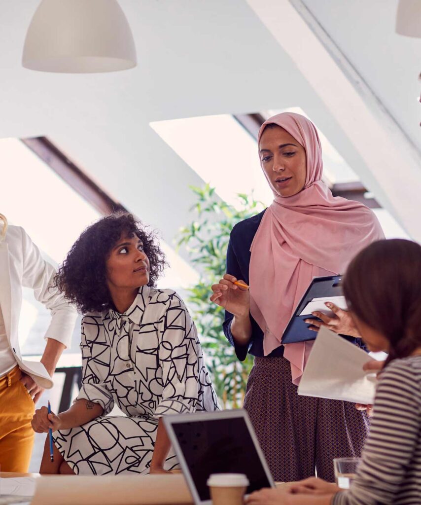 a meeting in a diverse workspace