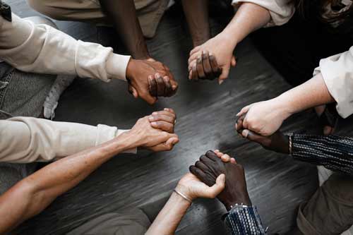 hands together in a safe workspace